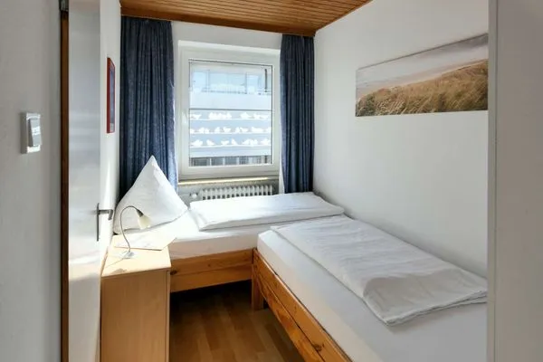 Schlafzimmer Haus Poseidon Ferienwohnung Nordseeblick