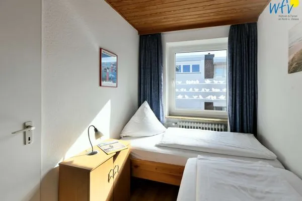 Schlafzimmer Haus Poseidon Ferienwohnung Nordseeblick