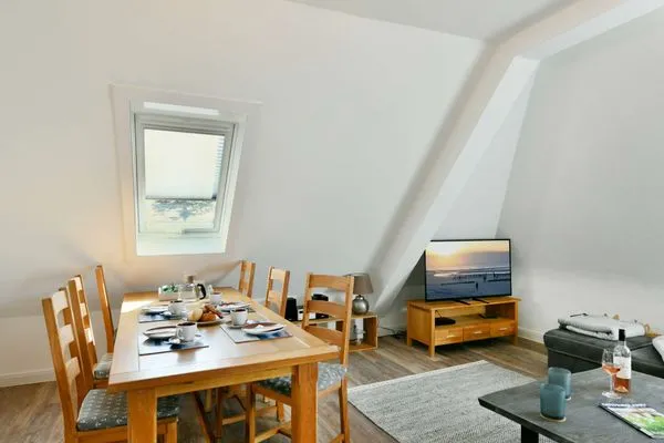 Wohnzimmer Haus Dünenrose Ferienwohnung Strandläufer