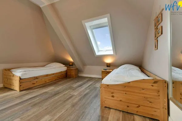 Schlafzimmer Haus Dünenrose Ferienwohnung Strandläufer