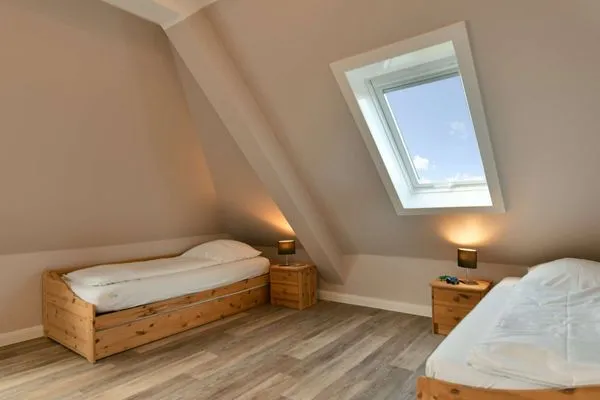 Schlafzimmer Haus Dünenrose Ferienwohnung Strandläufer
