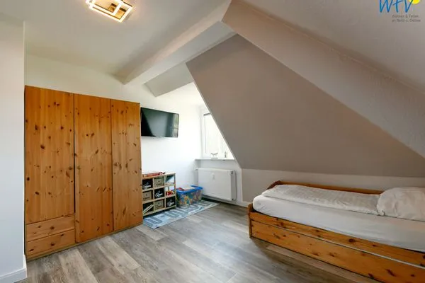 Schlafzimmer Haus Dünenrose Ferienwohnung Strandläufer