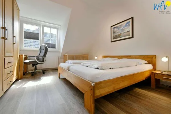 Schlafzimmer Haus Dünenrose Ferienwohnung Strandläufer