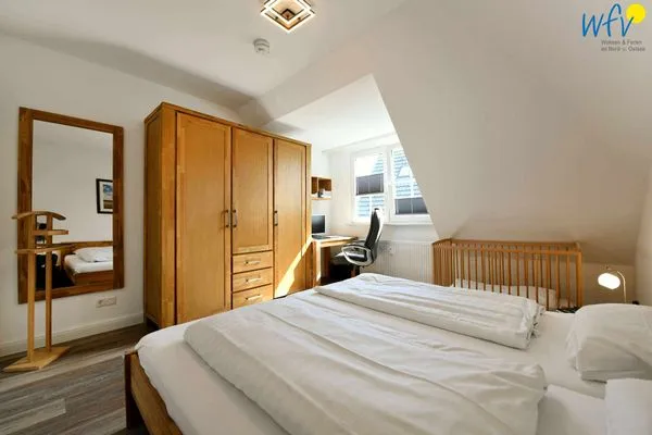 Schlafzimmer Haus Dünenrose Ferienwohnung Strandläufer