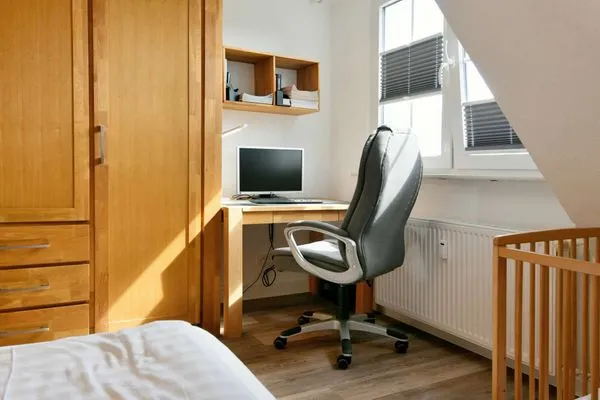 Schlafzimmer Haus Dünenrose Ferienwohnung Strandläufer