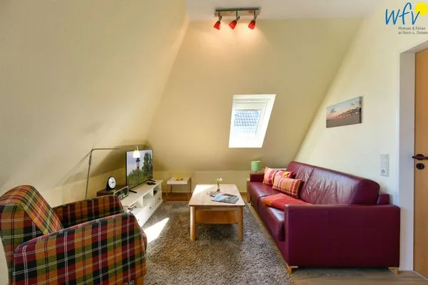 Wohnzimmer Haus Dünenrose Ferienwohnung Inselnest