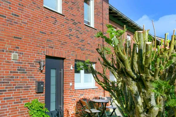 Fassade / Eingang Ferienhäuser Siedlerstraße 11 Ferienhaus Nordseeglück 11.6