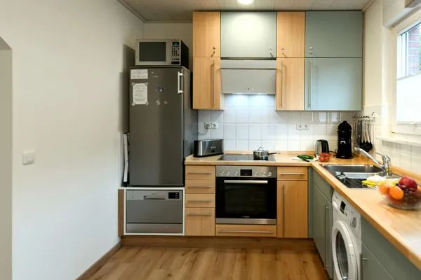 Küche / Küchenzeile Ferienhäuser Siedlerstraße 11 Ferienhaus Nordseeglück 11.6