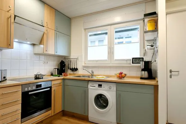 Küche / Küchenzeile Ferienhäuser Siedlerstraße 11 Ferienhaus Nordseeglück 11.6