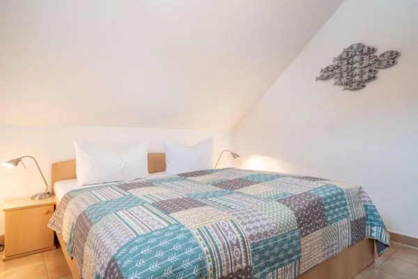 Schlafzimmer mit Doppelbett Residenz am Strand Wohnung 5-73