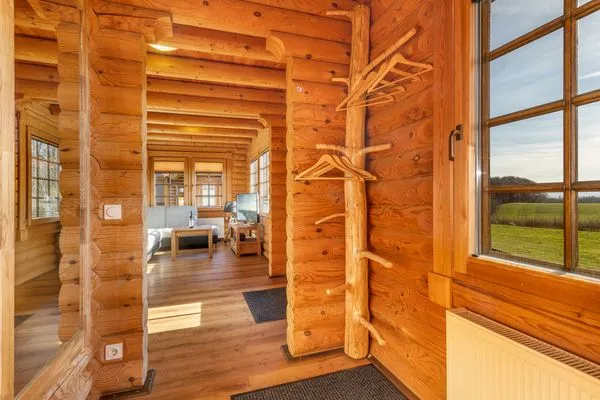 Wohnzimmer  Blockhaus James Cook - Meerblick