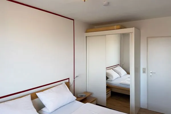 Schlafzimmer der Ferienwohnung Anneliese in Wittdün auf Amrum Haus Nordenlicht Ferienwohnung "Kiek-an"