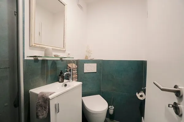 Gäste-WC  Ferienwohnung Hygge für zwei Personen im Naturpark Hüttener Berge in Ostseenähe