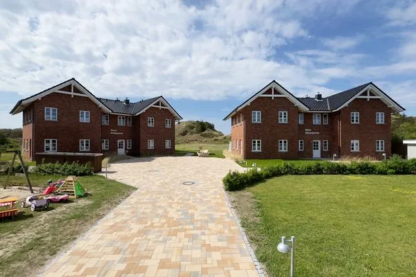 Nachbarschaft Haus Dünenperle Ferienwohnung "Dünengras"