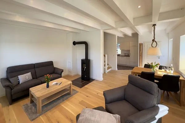 Wohnzimmer Haus Dünenperle Ferienwohnung "Dünengras"