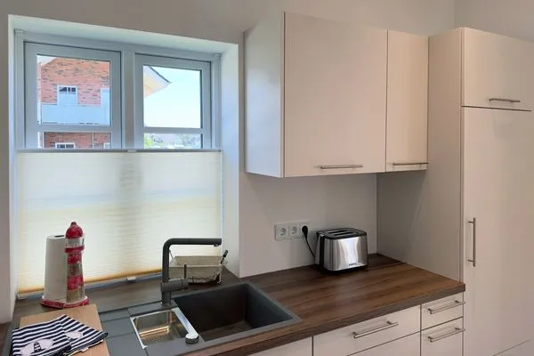 Küche / Küchenzeile Haus Dünenperle Ferienwohnung "Dünengras"