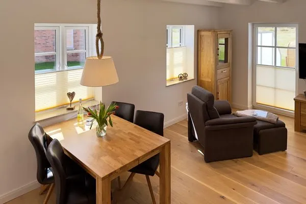 Wohnzimmer Haus Dünenperle Ferienwohnung "Dünengras"