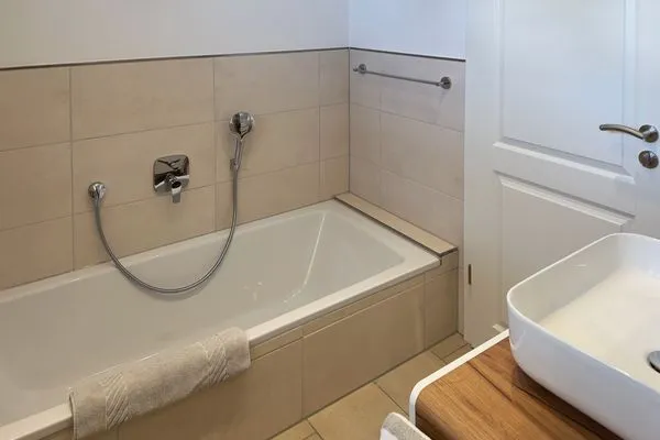 Badezimmer Haus Dünenperle Ferienwohnung "Dünengras"