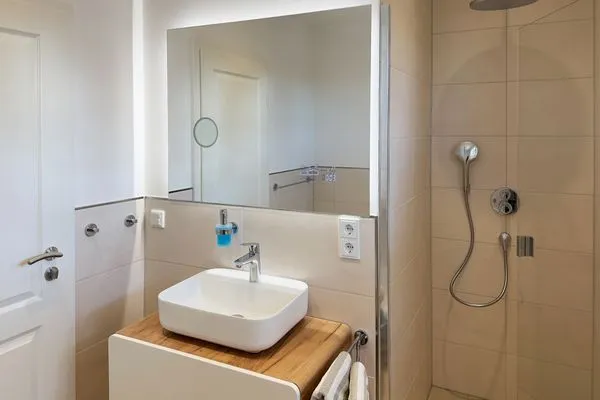 Badezimmer Haus Dünenperle Ferienwohnung "Dünengras"