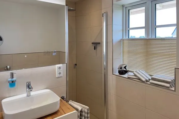 Badezimmer Haus Dünenperle Ferienwohnung "Dünengras"