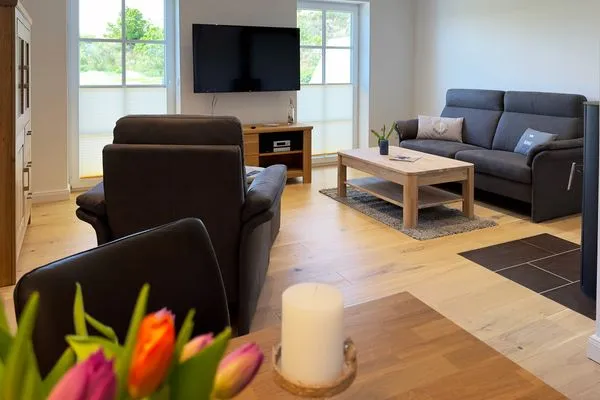 Wohnzimmer Haus Dünenperle Ferienwohnung "Wanderdüne"