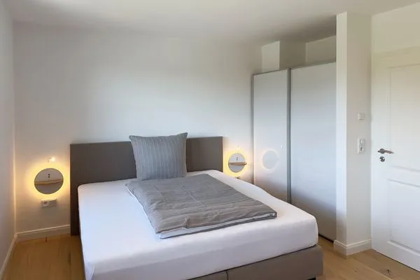 Schlafzimmer Haus Dünenperle Ferienwohnung "Wanderdüne"