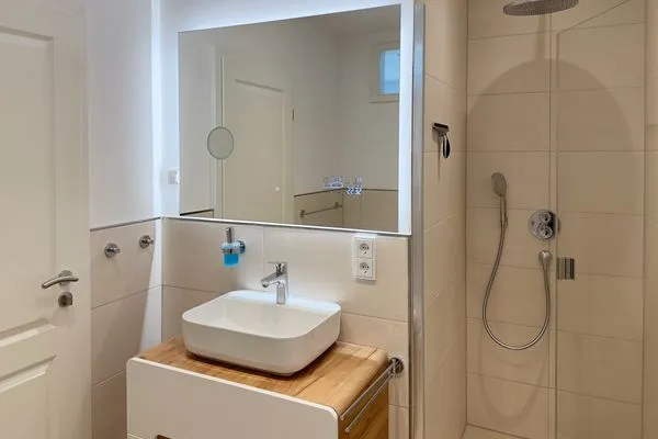 Badezimmer Haus Dünenperle Ferienwohnung "Wanderdüne"