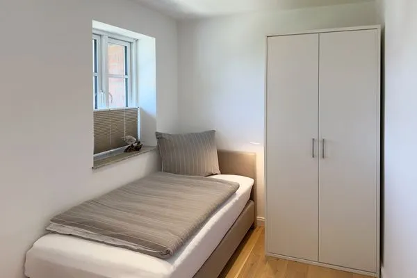 Schlafzimmer Haus Dünenperle Ferienwohnung "Wanderdüne"