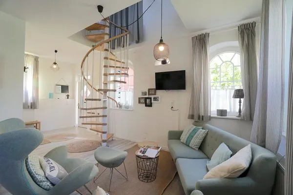 Wohnzimmer  Einladende Ferienunterkunft 'Tischlerhaus' im Herzen von Schleswig