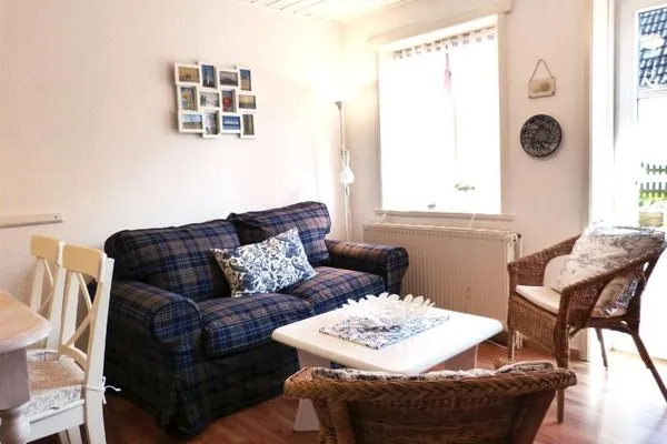 Wohnzimmer in der Ferienwohnung Fiiwfut in Süddorf auf Amrum Hüs Sanskiin Ferienwohnung *Fiiwfut*