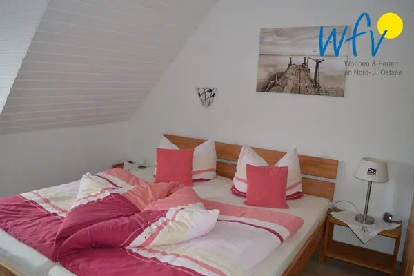 Schlafzimmer Haus Janine Ferienwohnung Dünenblick
