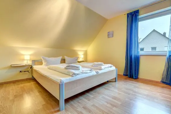 Schlafzimmer  Ferienhaus Krabbe