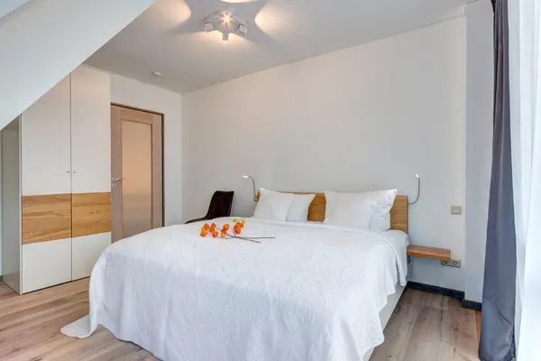 Schlafzimmer  Ferienhaus Waldoase 01