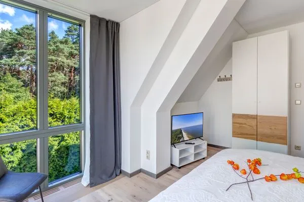 Schlafzimmer  Ferienhaus Waldoase 01