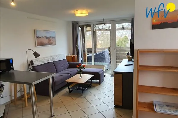 Wohnzimmer Ferienhaus Greune-Stee-Weg 103b Ferienwohnung Inselblick