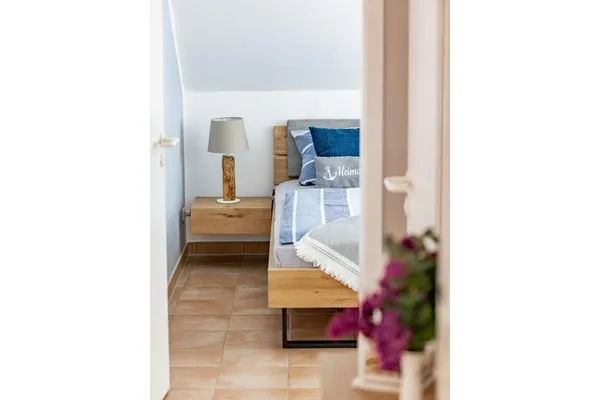 Blick in das Schlafzimmer Residenz am Strand Wohnung 6-80