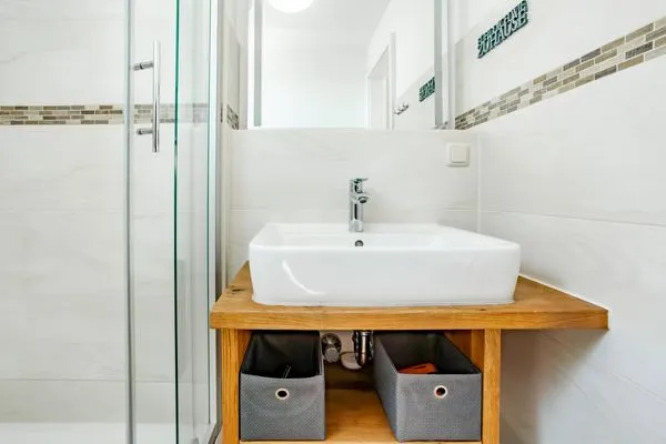 Badezimmer mit Dusche Residenz am Strand Wohnung 6-80
