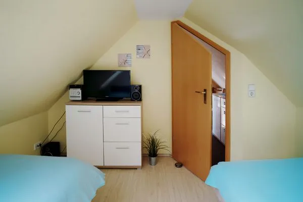 Schlafzimmer mit Einzelbetten Ferienpark Freesenbruch Wohnung 3.6 - Frieda