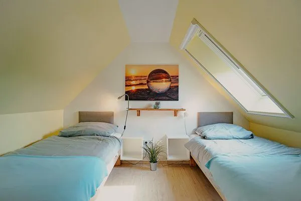 Schlafzimmer mit Einzelbetten Ferienpark Freesenbruch Wohnung 3.6 - Frieda