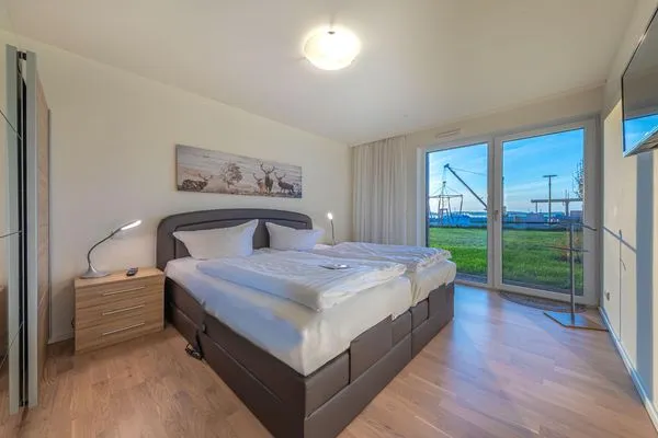 Ferienwohnung MüritzKieker Hafenresidenz Waren (Müritz) - Schlafzimmer mit Hafenblick  MüritzKieker