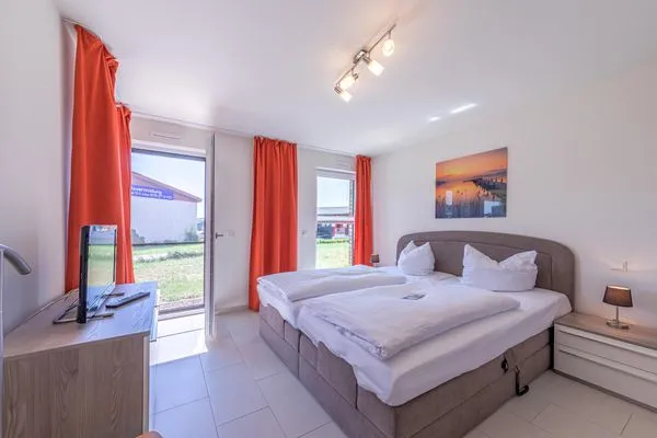 Ferienwohnung Leonie Hafenresidenz Waren (Müritz) - Schlafzimmer mit Doppelbett  Leonie