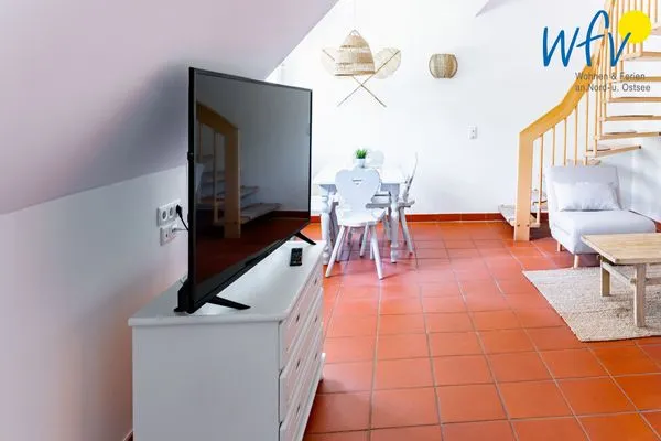 Wohnzimmer Ferienhaus am Gutspark Dranske Ferienwohnung Seegras