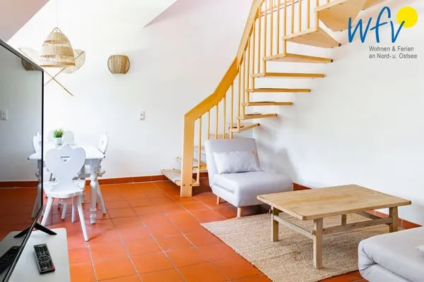 Wohnzimmer Ferienhaus am Gutspark Dranske Ferienwohnung Seegras