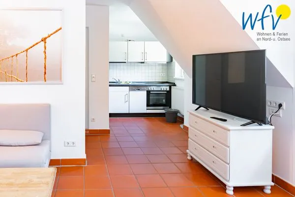 Wohnzimmer Ferienhaus am Gutspark Dranske Ferienwohnung Seegras