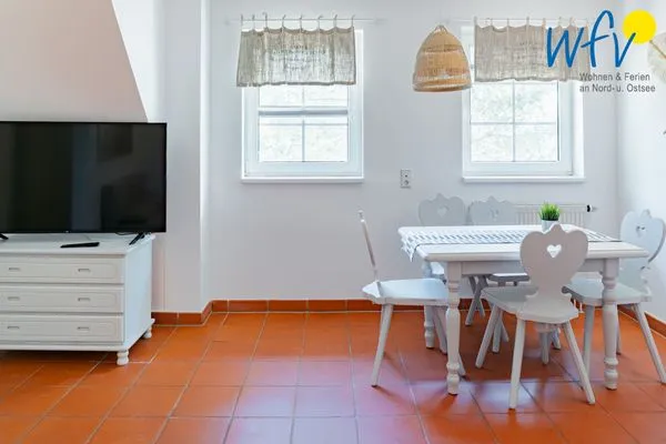 Wohnzimmer Ferienhaus am Gutspark Dranske Ferienwohnung Seegras