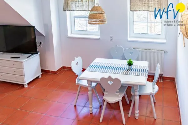 Wohnzimmer Ferienhaus am Gutspark Dranske Ferienwohnung Seegras