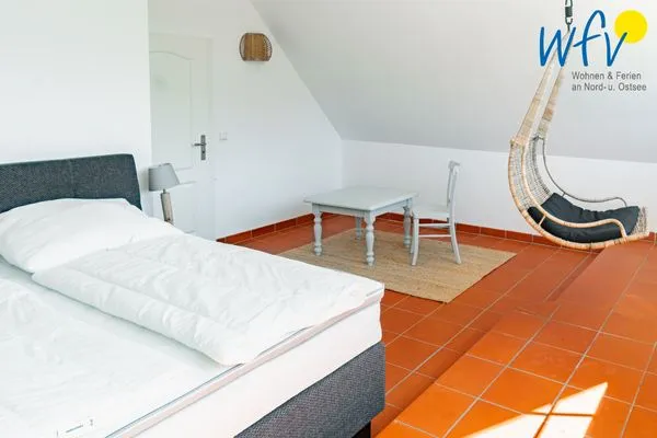 Schlafzimmer Ferienhaus am Gutspark Dranske Ferienwohnung Seegras