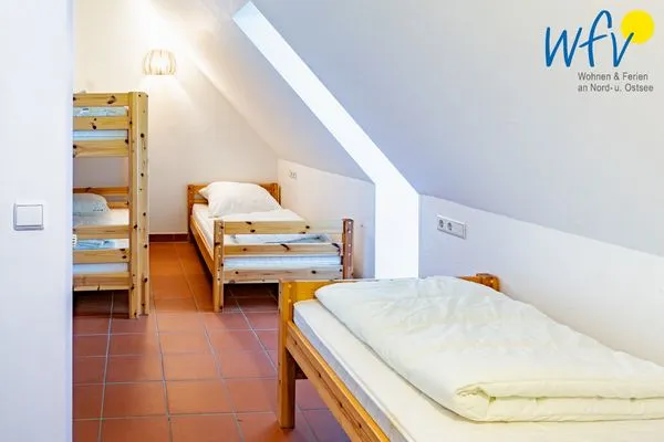 Schlafzimmer Ferienhaus am Gutspark Dranske Ferienwohnung Seegras