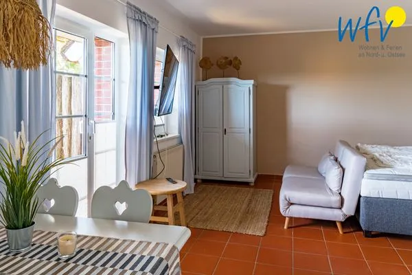 Wohnzimmer Ferienhaus am Gutspark Dranske Ferienwohnung Sonnengarten