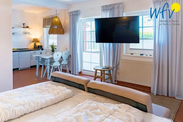 Schlafzimmer Ferienhaus am Gutspark Dranske Ferienwohnung Sonnengarten